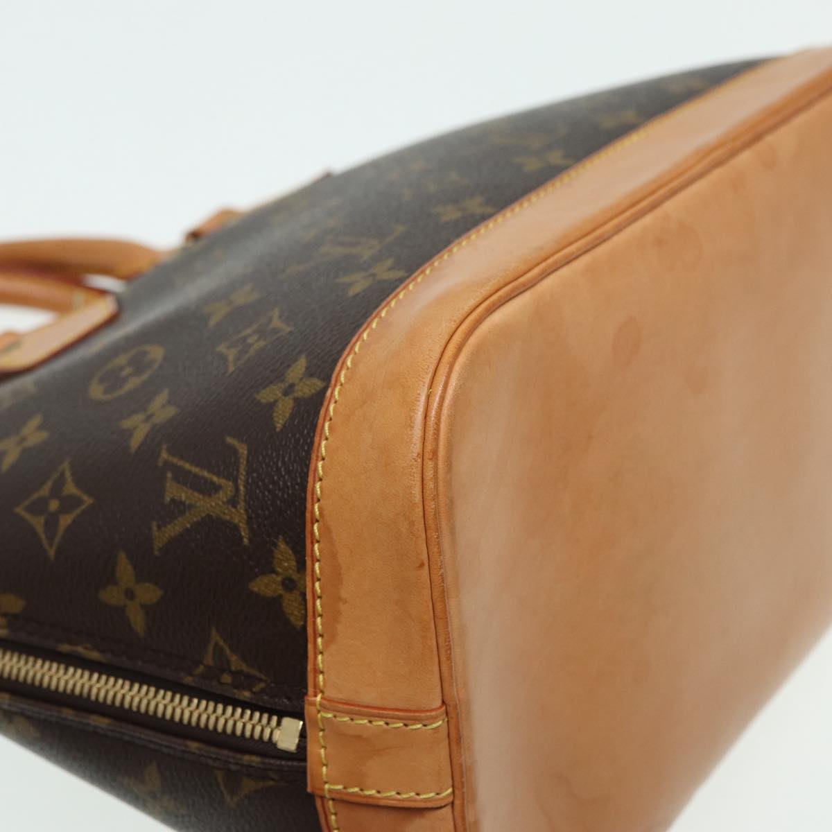 LOUIS VUITTON Alma Handbag
