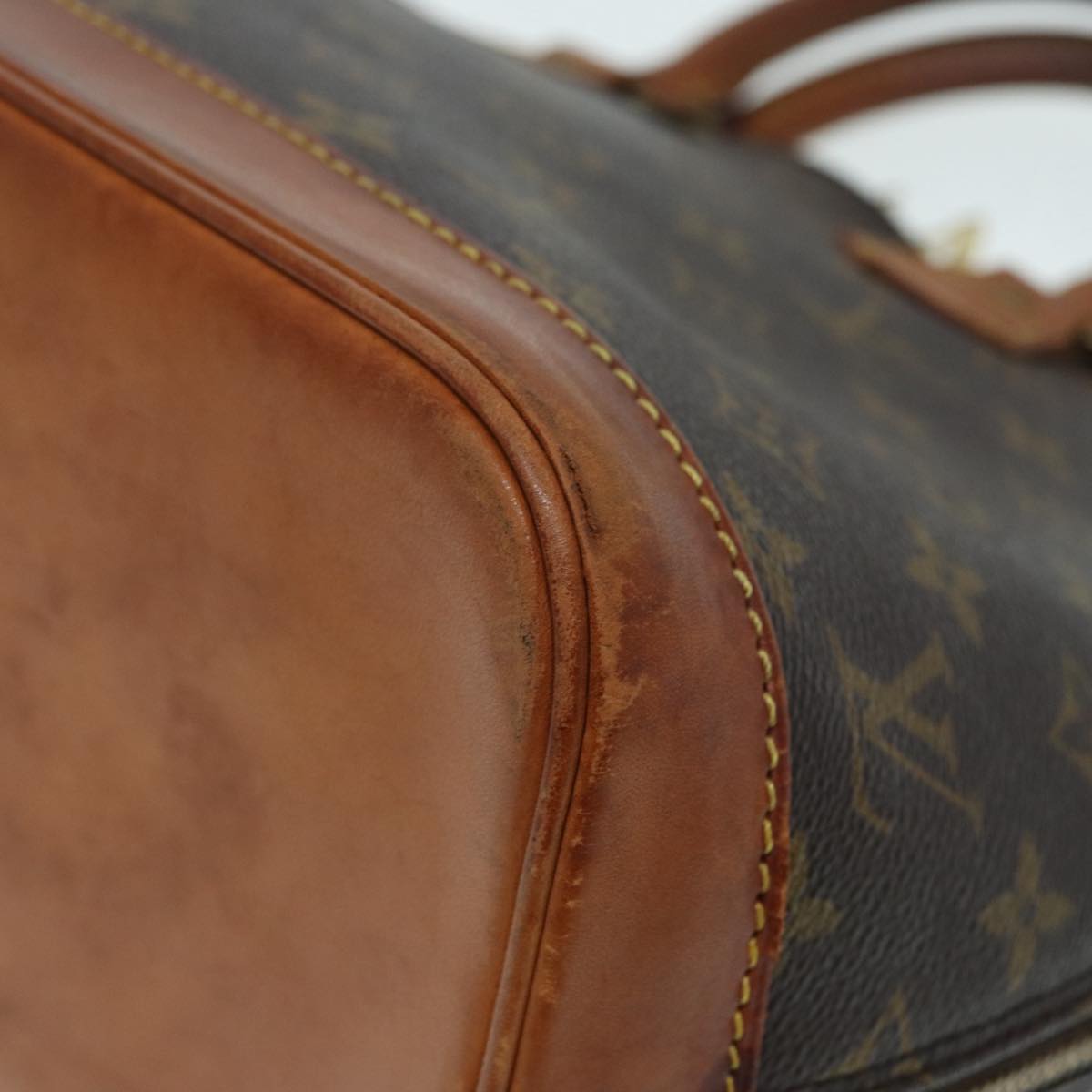 LOUIS VUITTON Alma Handbag