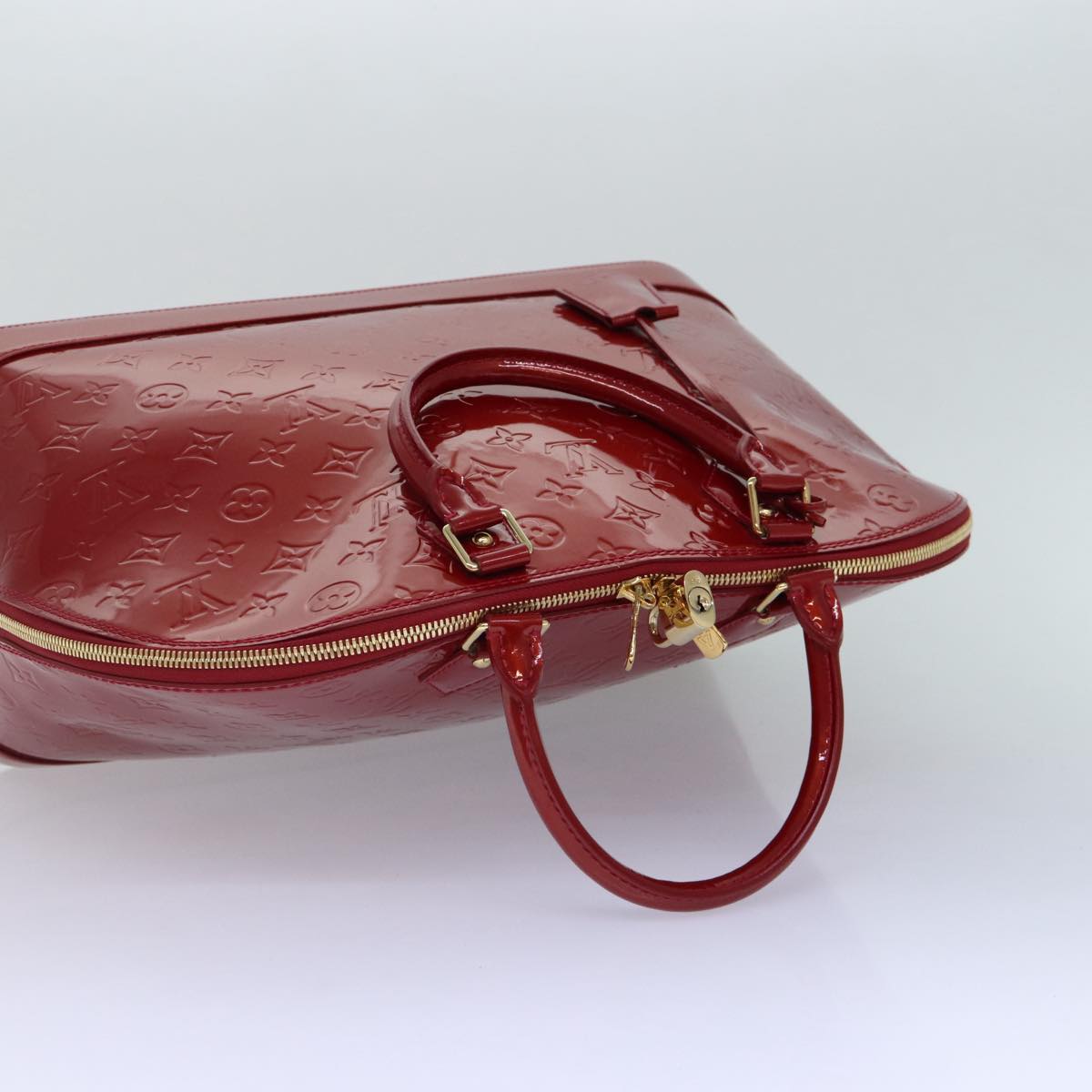 LOUIS VUITTON Alma Handbag
