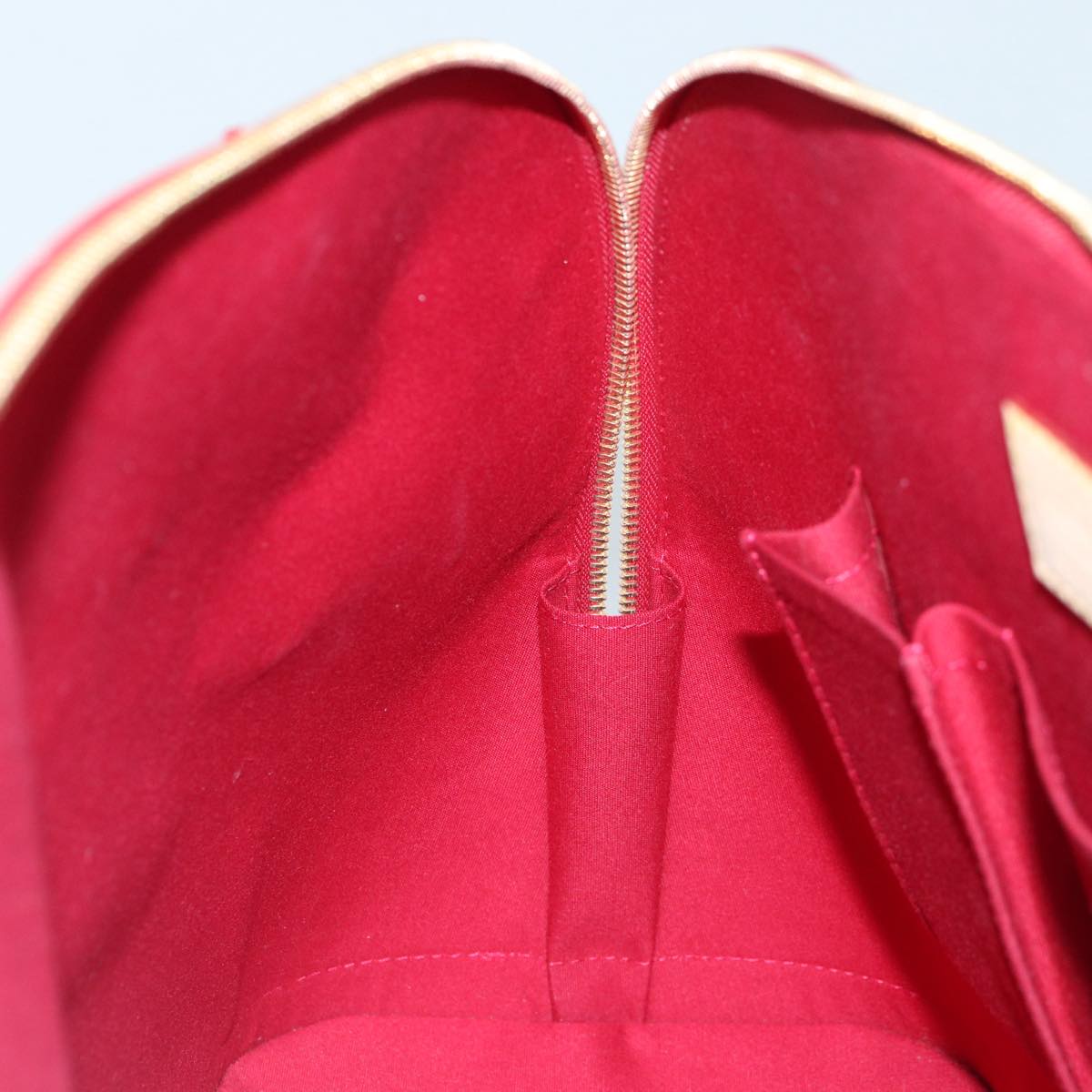LOUIS VUITTON Alma Handbag