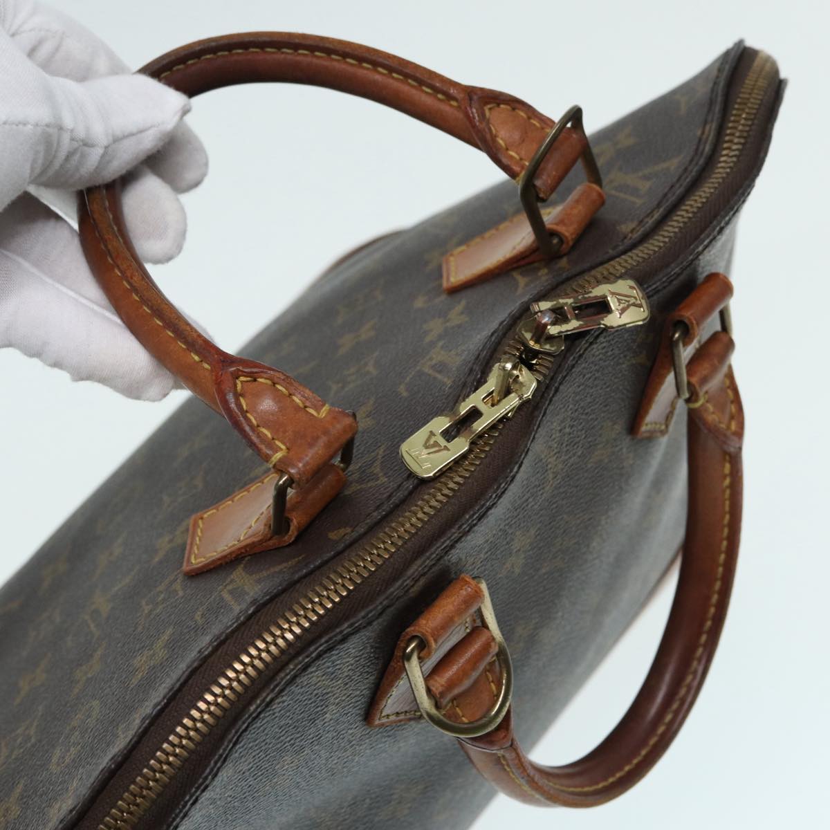 LOUIS VUITTON Alma Handbag