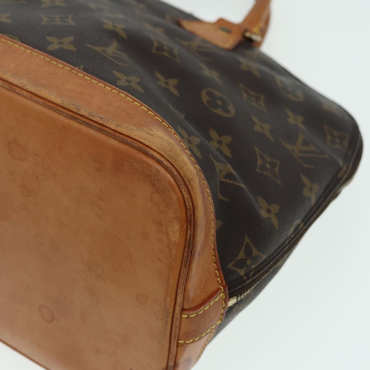 LOUIS VUITTON Alma Handbag