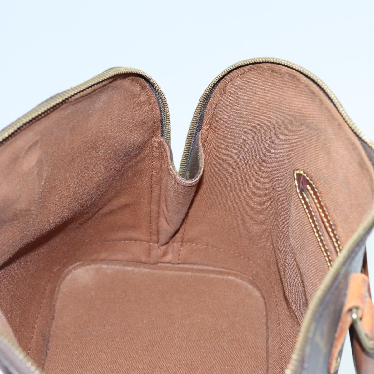 LOUIS VUITTON Alma Handbag