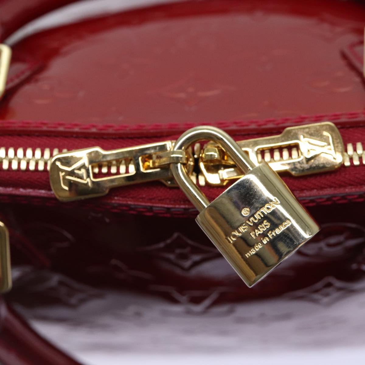LOUIS VUITTON Alma Handbag