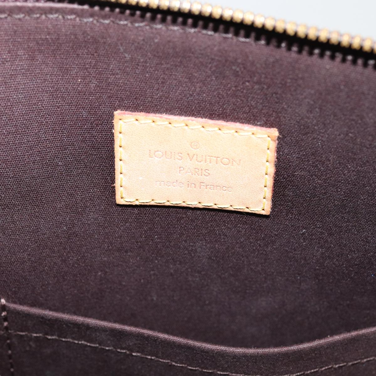 LOUIS VUITTON Alma Handbag