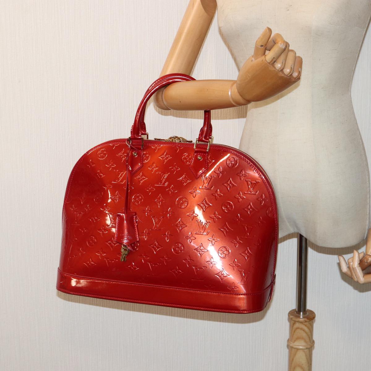 LOUIS VUITTON Alma Handbag