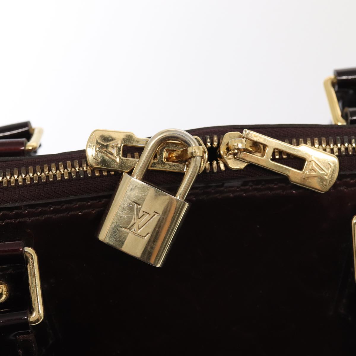 LOUIS VUITTON Alma Handbag