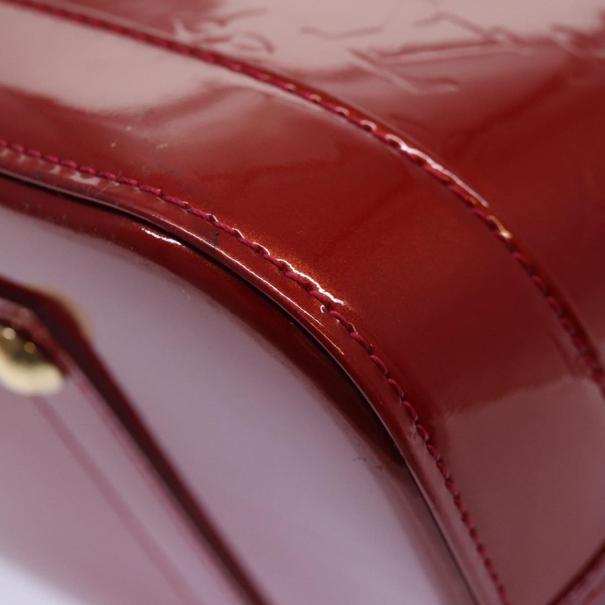 LOUIS VUITTON Alma Handbag