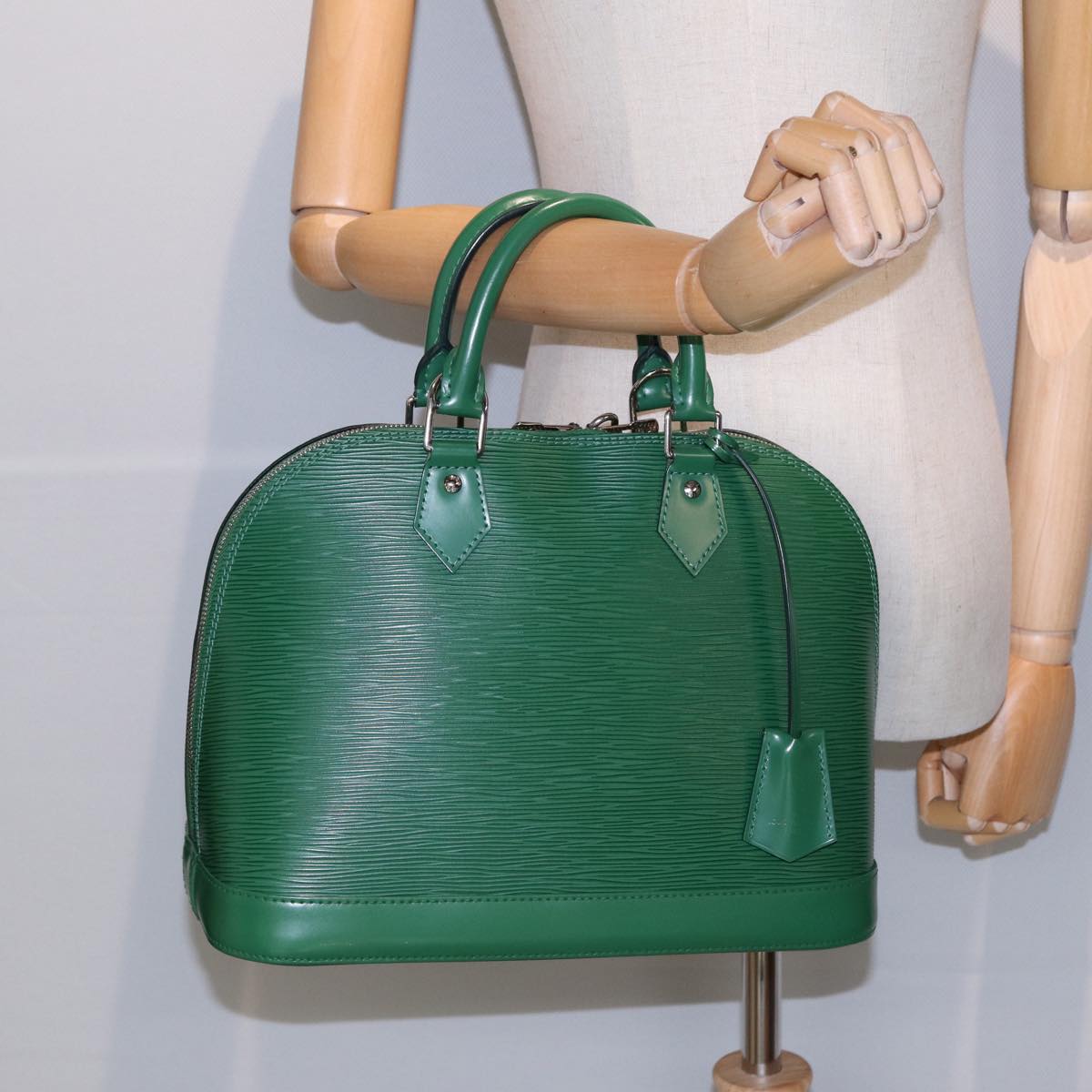 LOUIS VUITTON Alma Handbag
