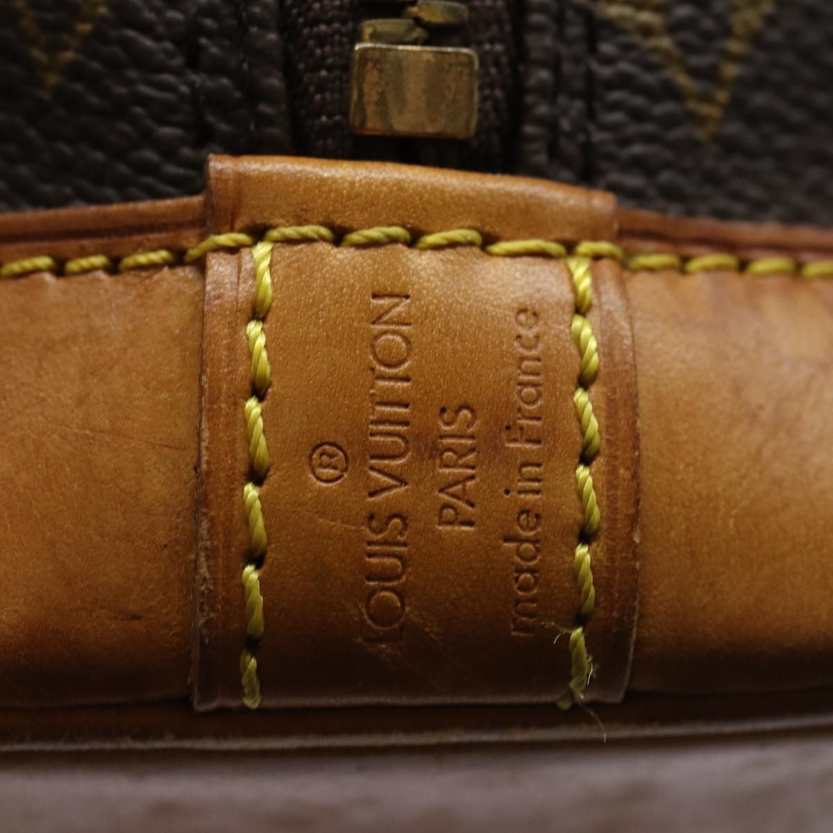 LOUIS VUITTON Alma Handbag