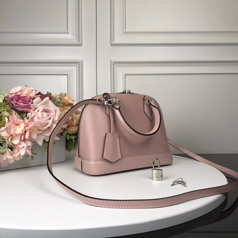 Alice Bags- Louis Vuittons  - 16346