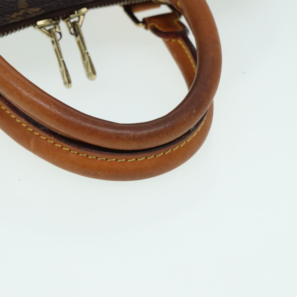 LOUIS VUITTON Alma Handbag