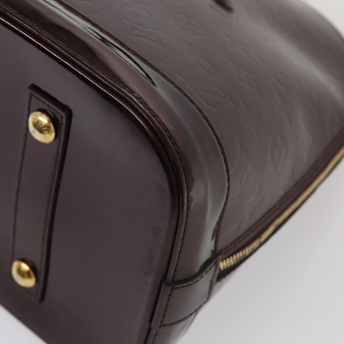 LOUIS VUITTON Alma Handbag