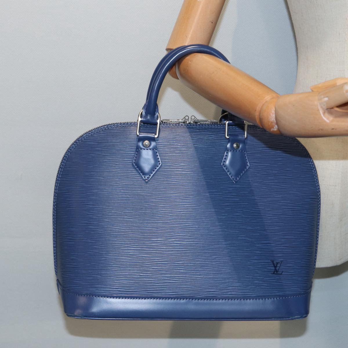 LOUIS VUITTON Alma Handbag