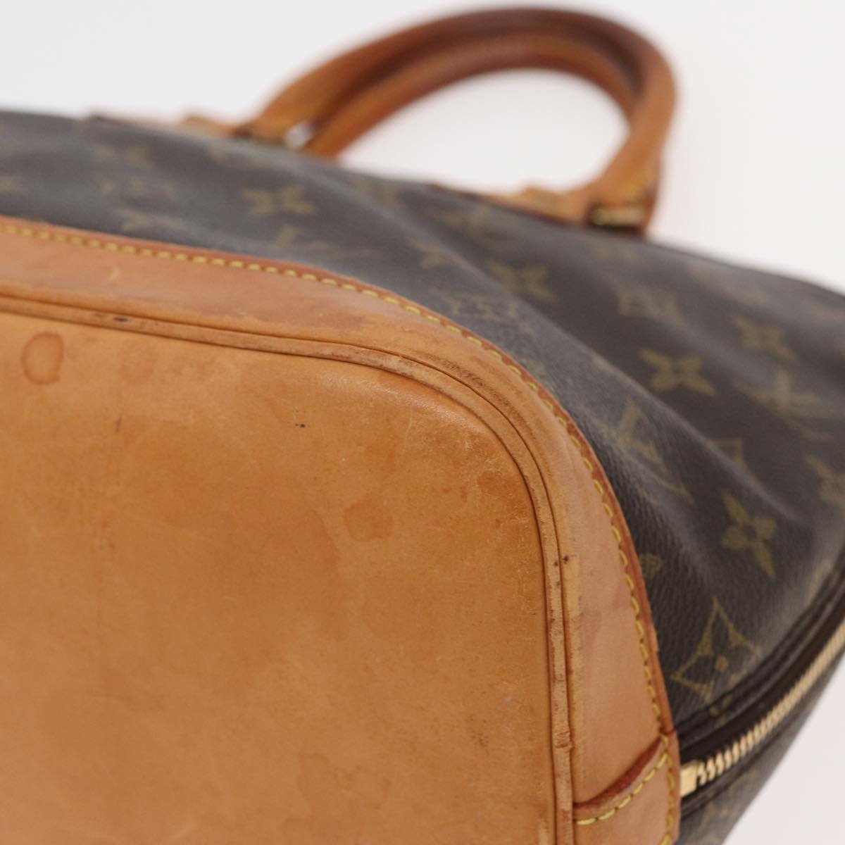 LOUIS VUITTON Alma Handbag
