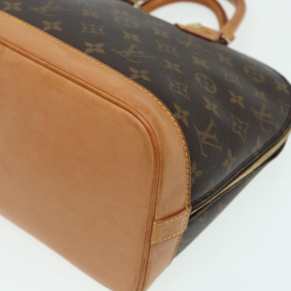 LOUIS VUITTON Alma Handbag