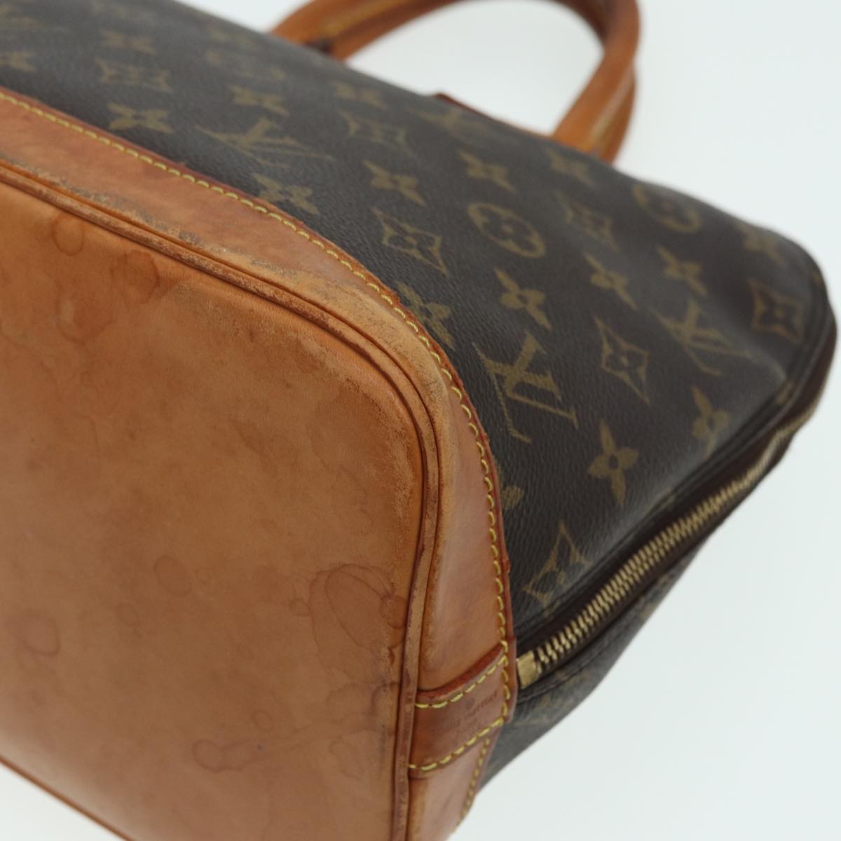 LOUIS VUITTON Alma Handbag