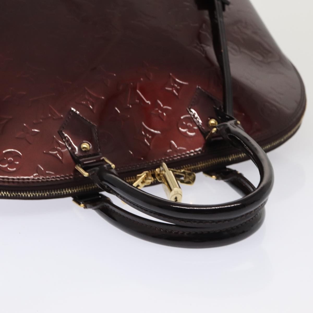 LOUIS VUITTON Alma Handbag