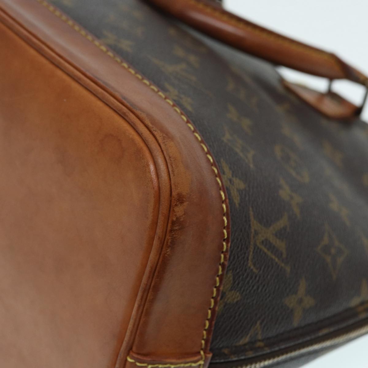 LOUIS VUITTON Alma Handbag