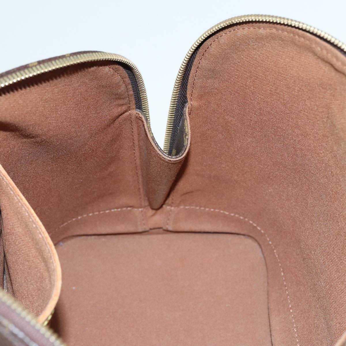 LOUIS VUITTON Alma Handbag