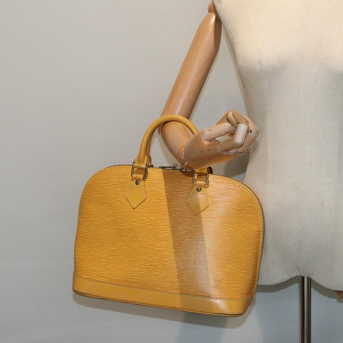 LOUIS VUITTON Alma Handbag