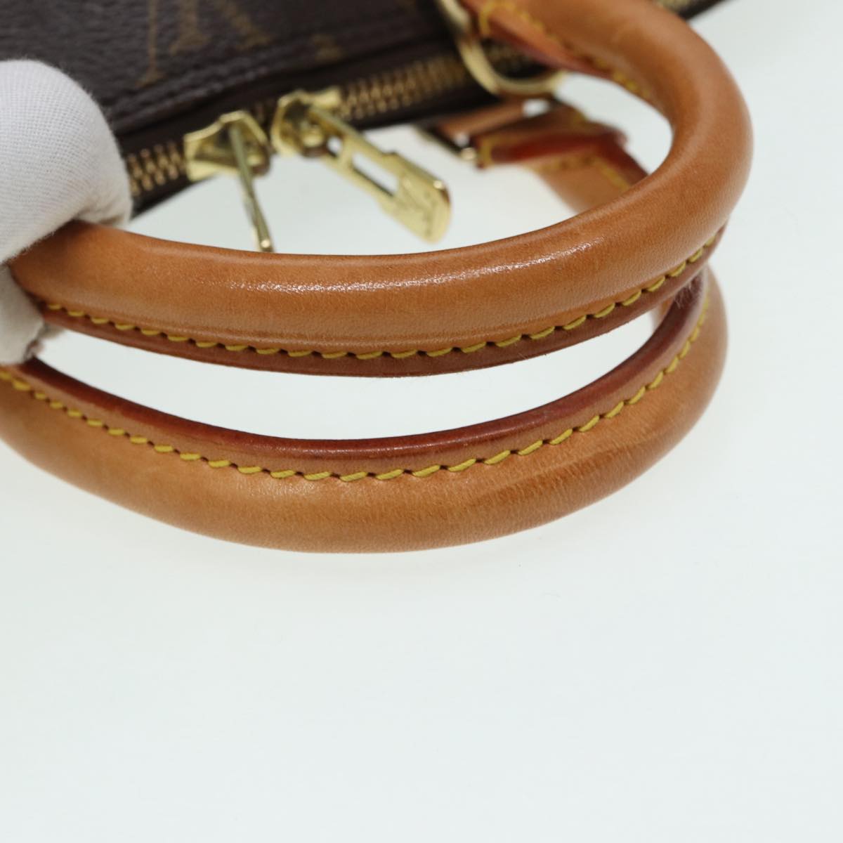 LOUIS VUITTON Alma Handbag