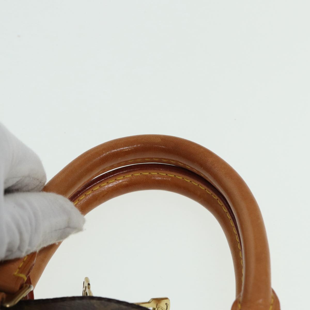 LOUIS VUITTON Alma Handbag