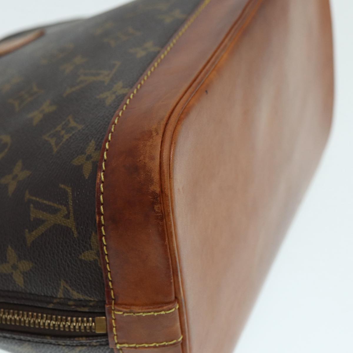 LOUIS VUITTON Alma Handbag