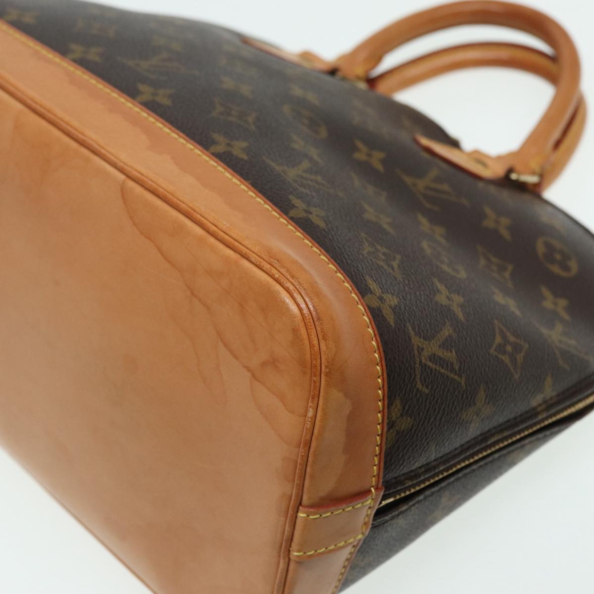 LOUIS VUITTON Alma Handbag
