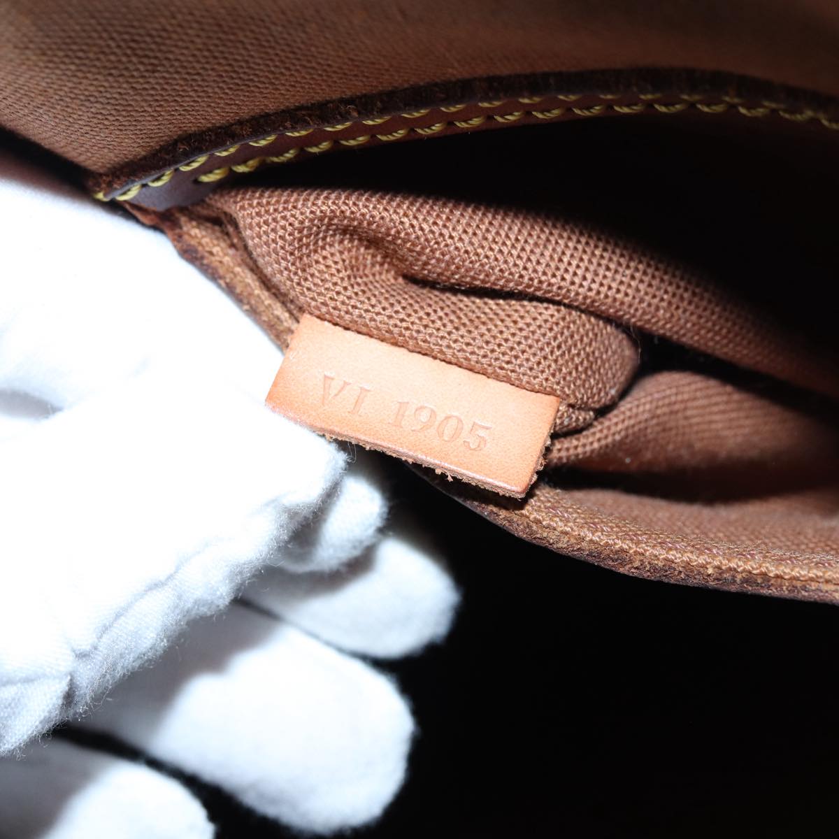 LOUIS VUITTON Alma Handbag