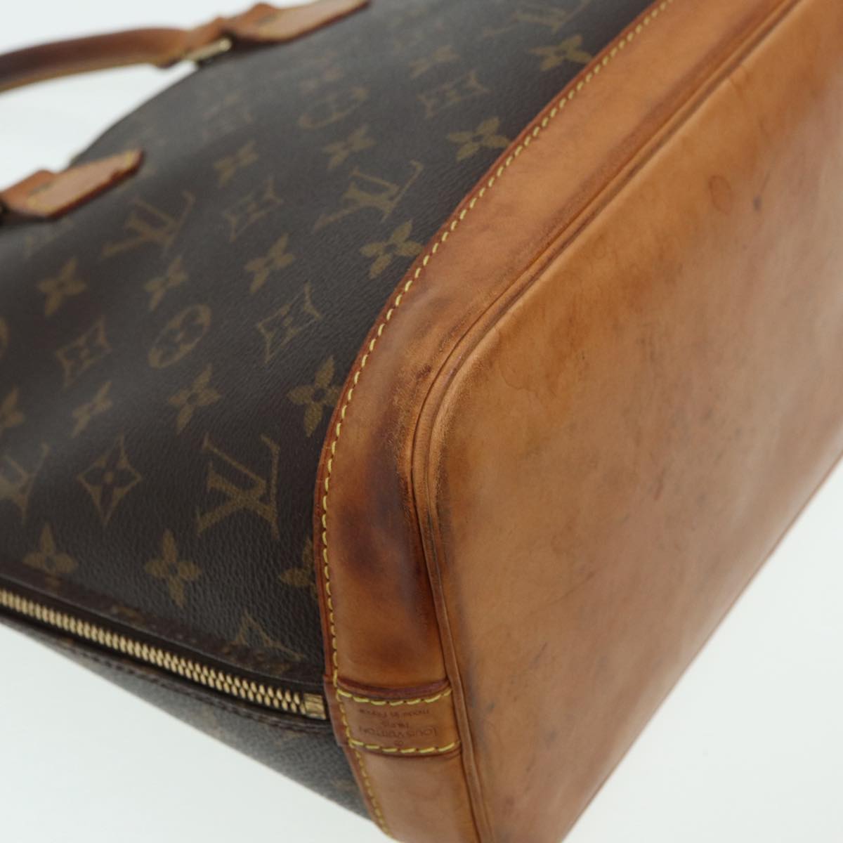 LOUIS VUITTON Alma Handbag