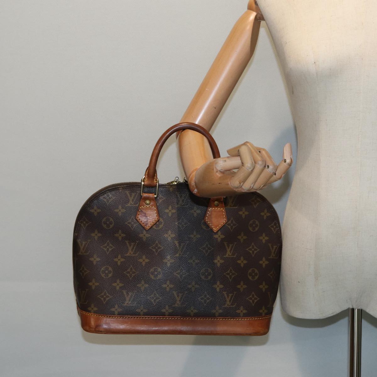 LOUIS VUITTON Alma Handbag
