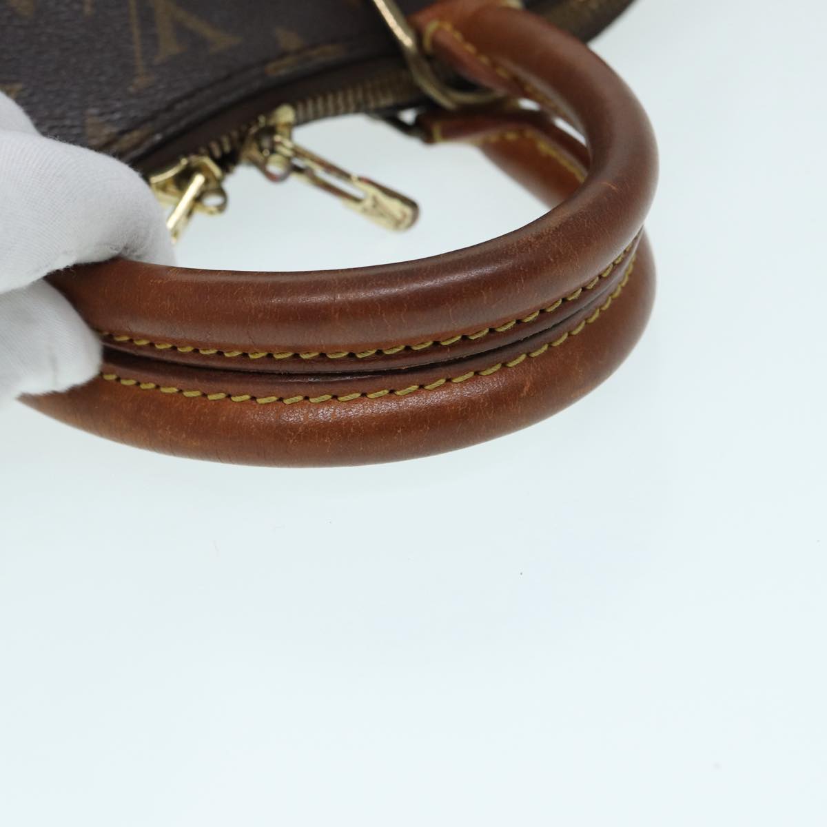 LOUIS VUITTON Alma Handbag
