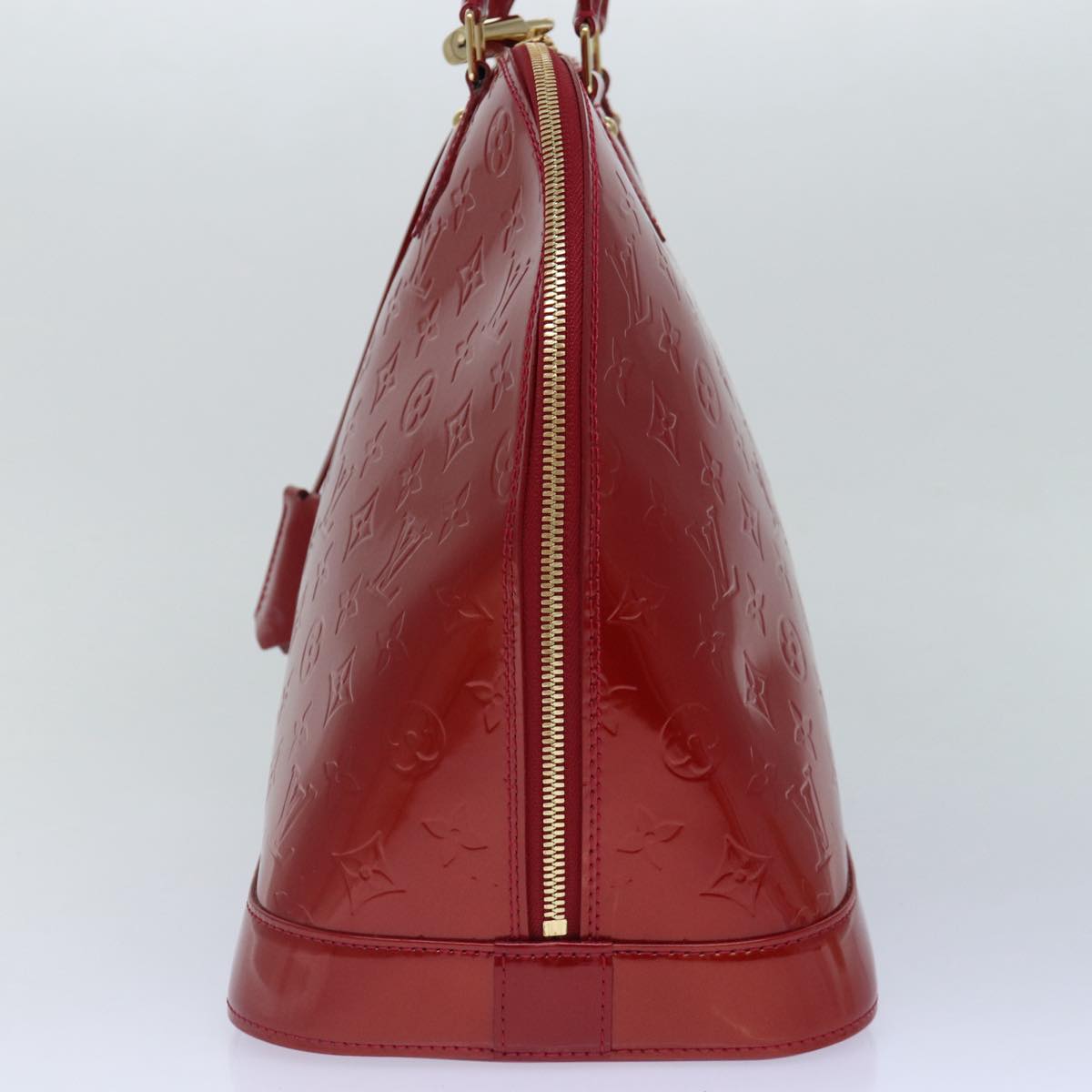LOUIS VUITTON Alma Handbag