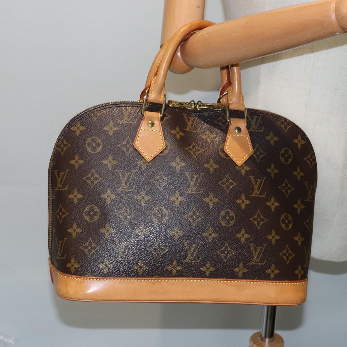 LOUIS VUITTON Alma Handbag
