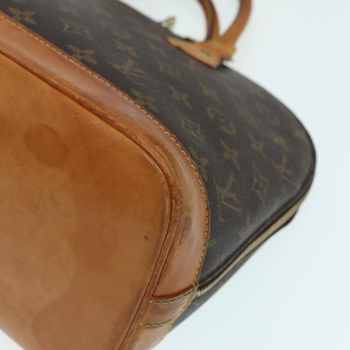 LOUIS VUITTON Alma Handbag