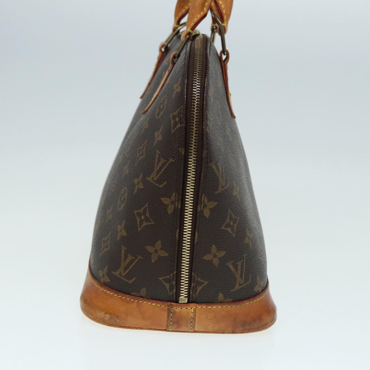 LOUIS VUITTON Alma Handbag