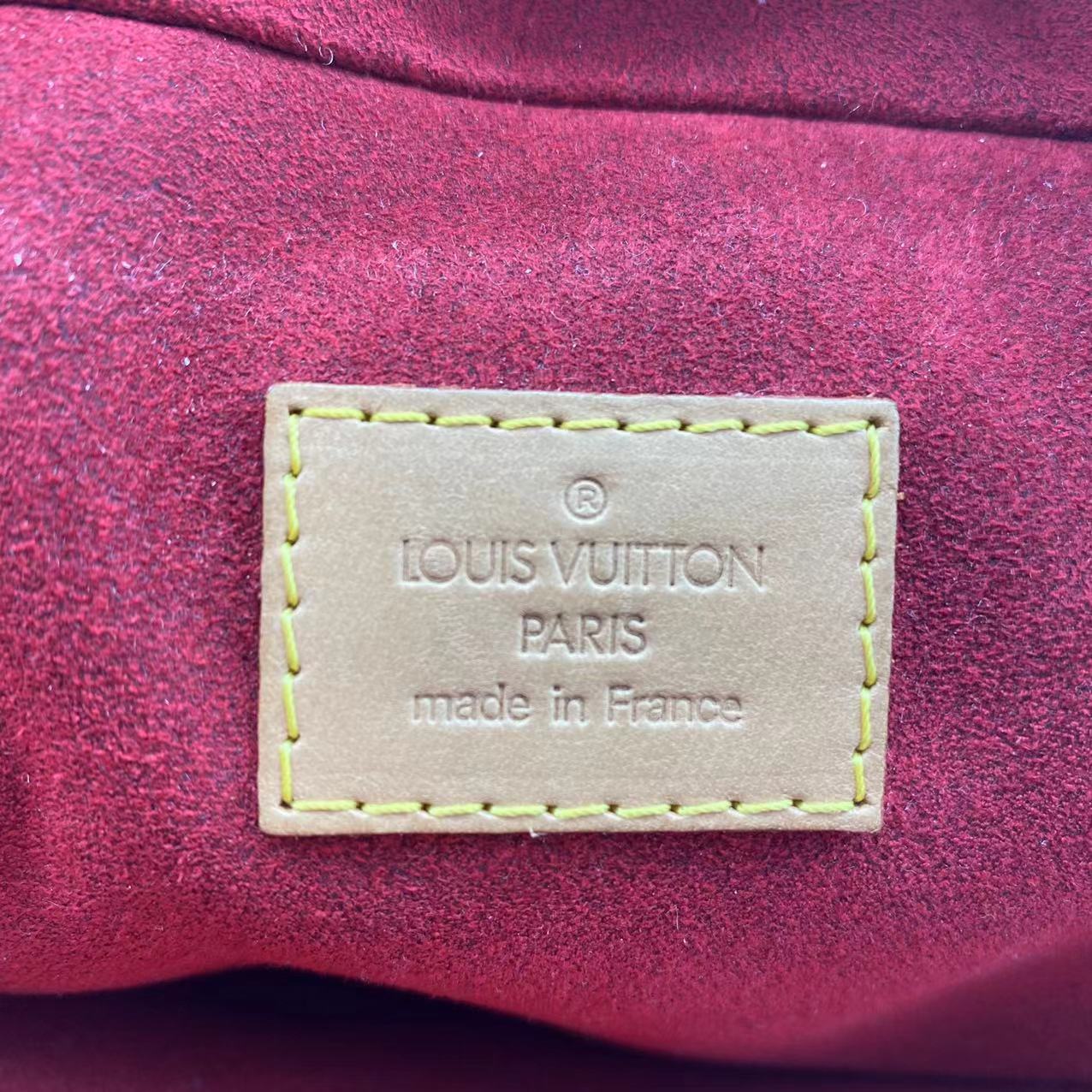 Louis Vuitton excentri cite handbag