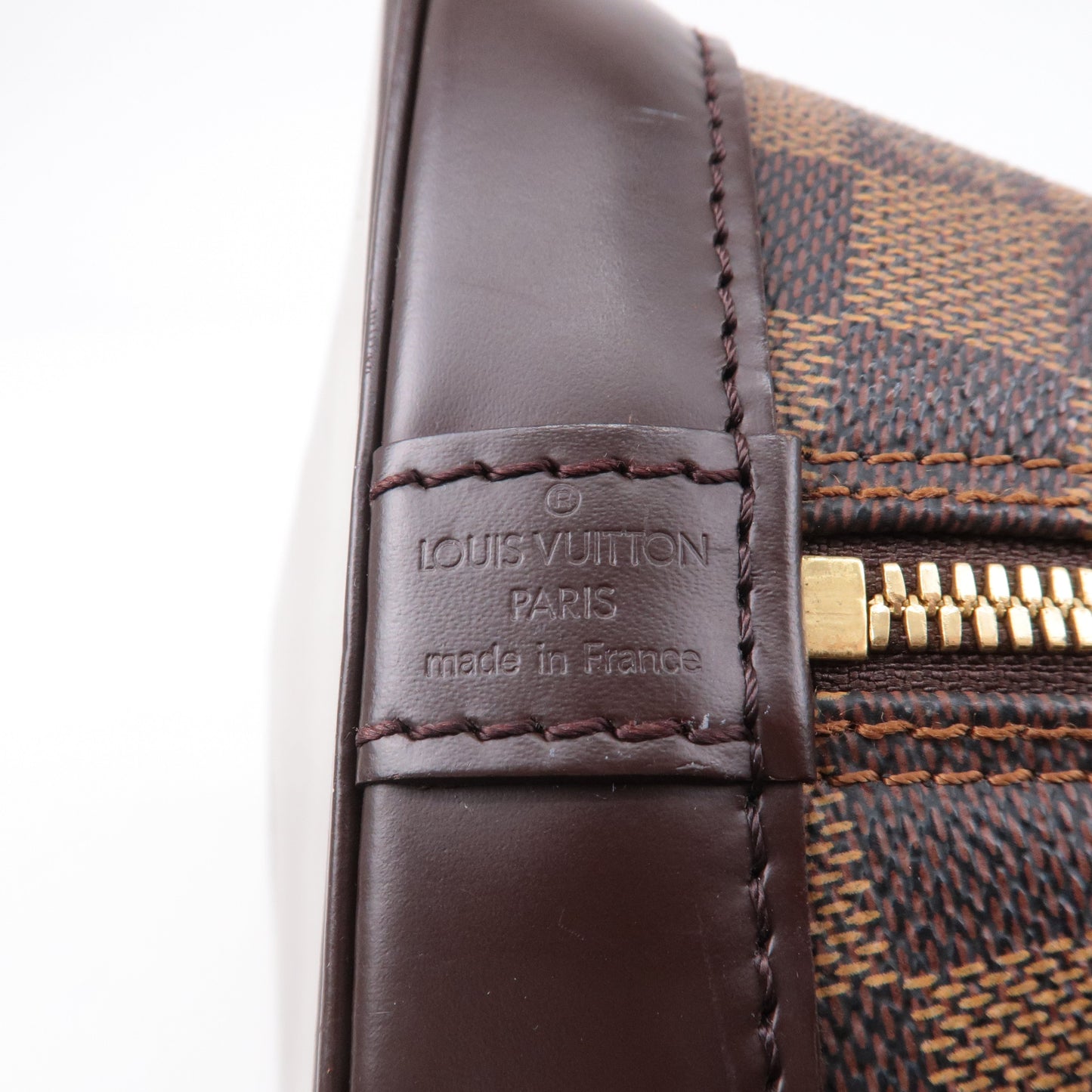 Louis Vuitton Damier Ebene Alma Hand Bag Brown N51131
