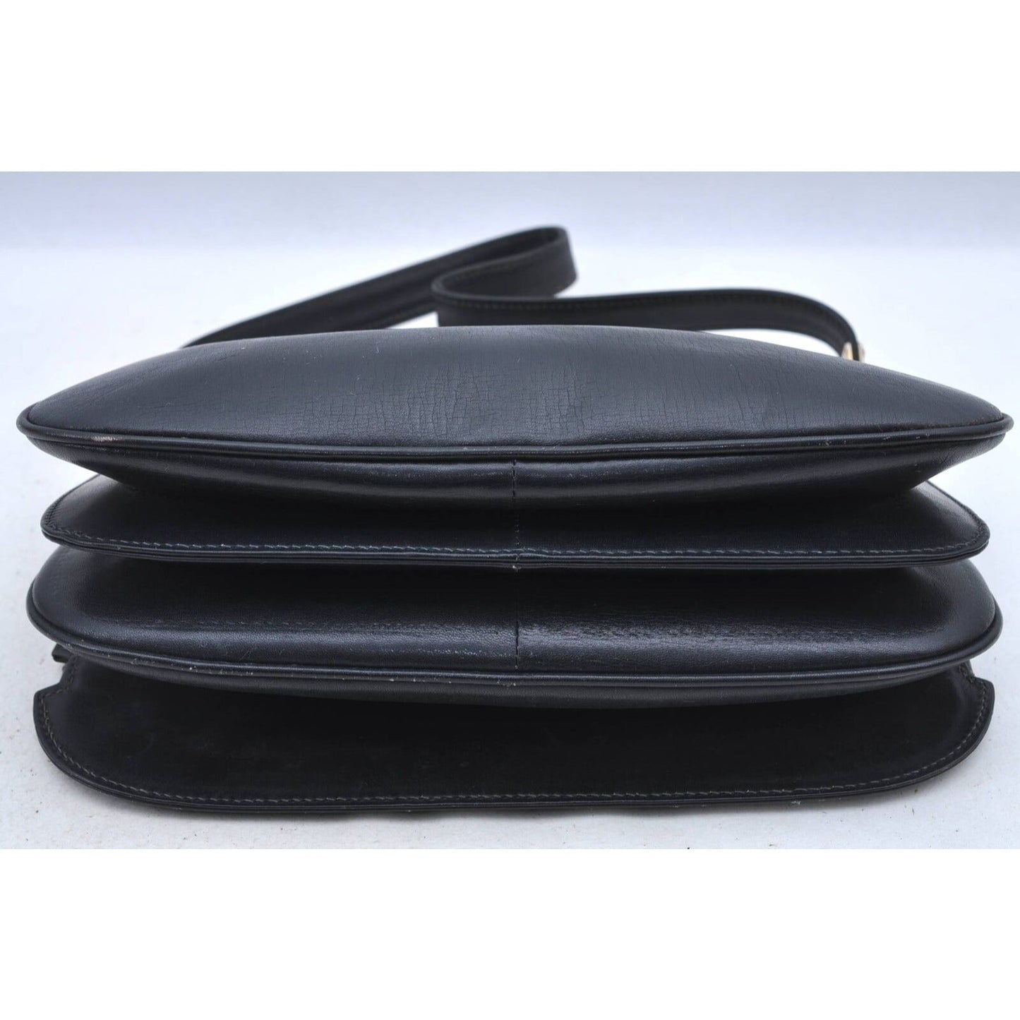 Gucci 60's navy leather saddle bag with gold logo clasp