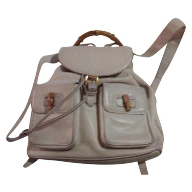 Gucci, white leather, larger size, two strap and bamboo handle, drawstring top, multi-pocket, messenger bag/backpack