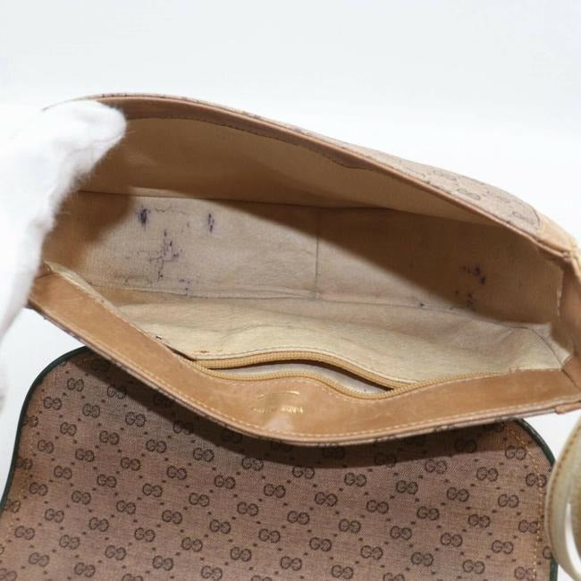 Gucci, rare, brown micro Guccissima print coated canvas/leather saddle bag with red and green inlaid leather stripes