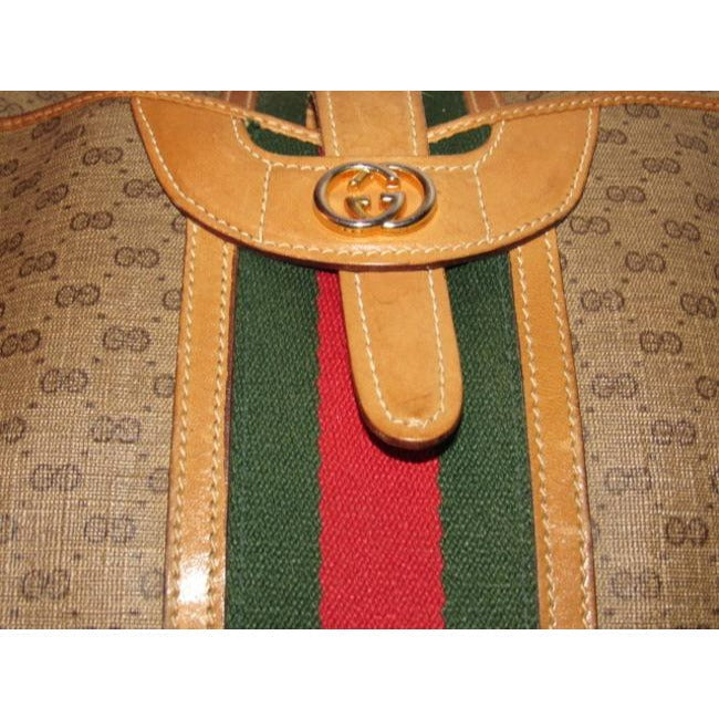 Gucci Gucci, unique, RARE, camel leather & brown small G logo, coated canvas, top zip, camera bag/bowler style, cross body