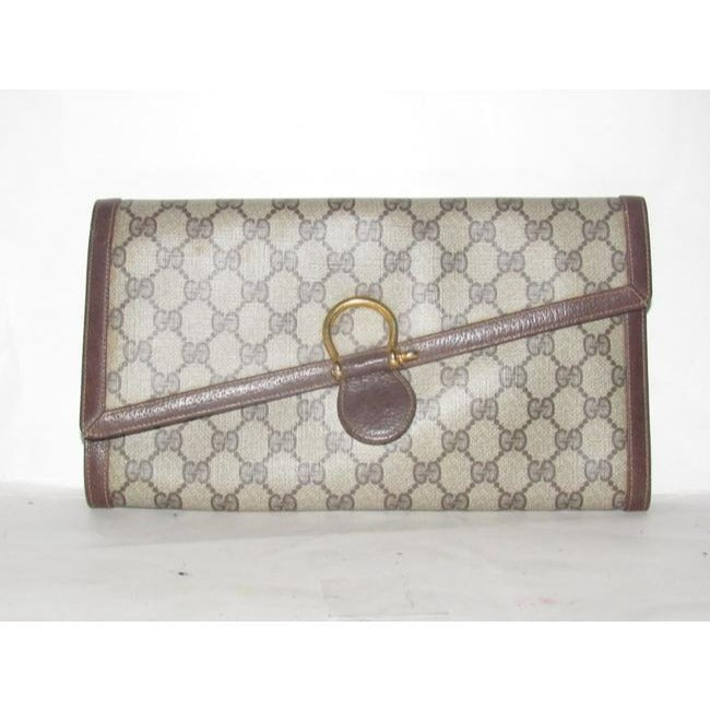 Gucci Vintage Pursesdesigner Purses Large G Logo Print Coated Canvas And Leather In Browns Clutch