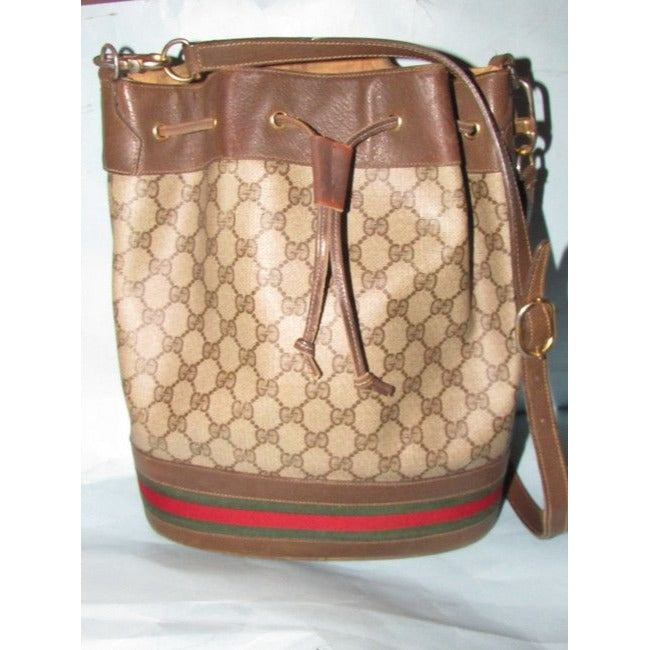 Gucci brown Guccissima print coated canvas & brown leather drawstring top Bucket Bag w red & green striped bottom