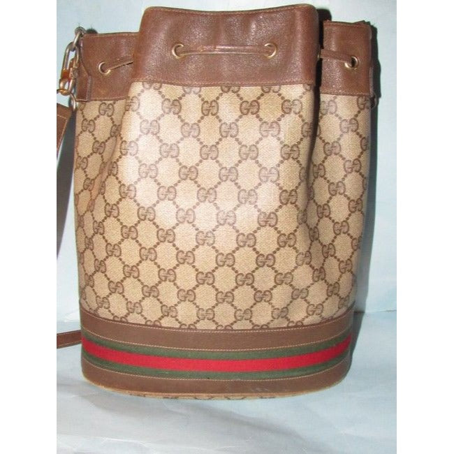 Gucci brown Guccissima print coated canvas & brown leather drawstring top Bucket Bag w red & green striped bottom