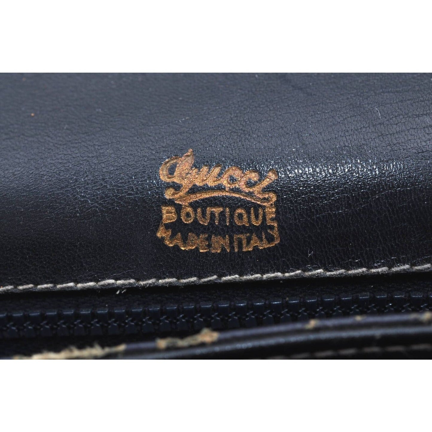 Gucci 60's navy leather saddle bag with gold logo clasp