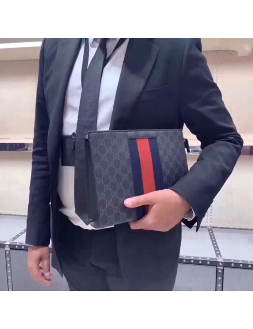 Gucci GG Supreme canvas clutch bag with striped webbing