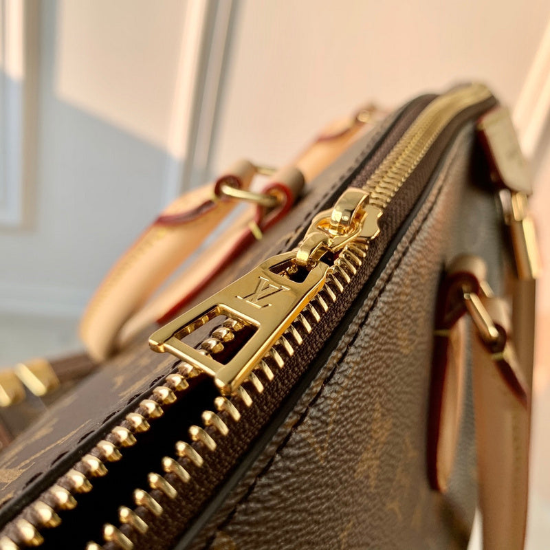 Alice Bags- Louis Vuittons  - 16599