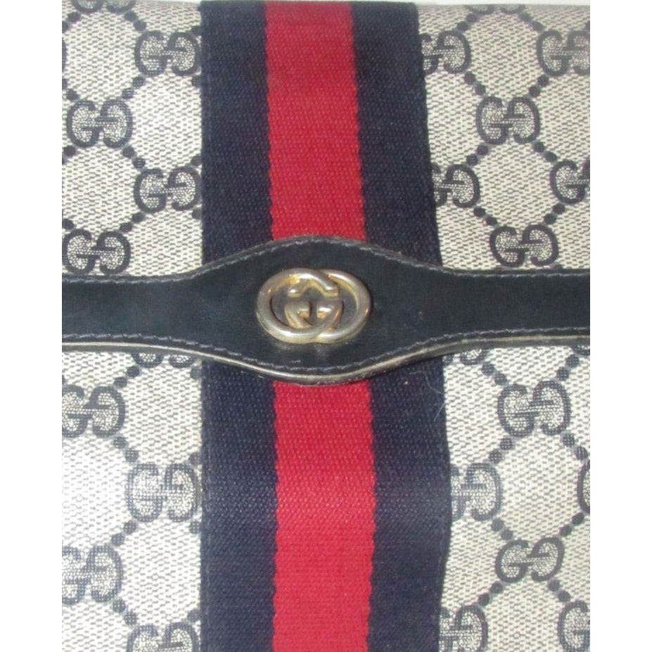 Gucci, navy Guccissima print coated canvas & leather, clutch or cosmetic bag with a red & blue Sherry striped center and envelope top